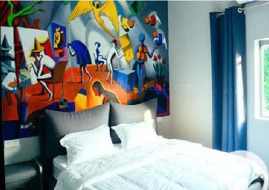 德安对于酒店的墙体彩绘而言更注重哪些方面？